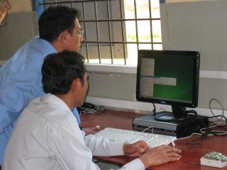 Teachers playing with Khmer software Teachers playing with Khmer software